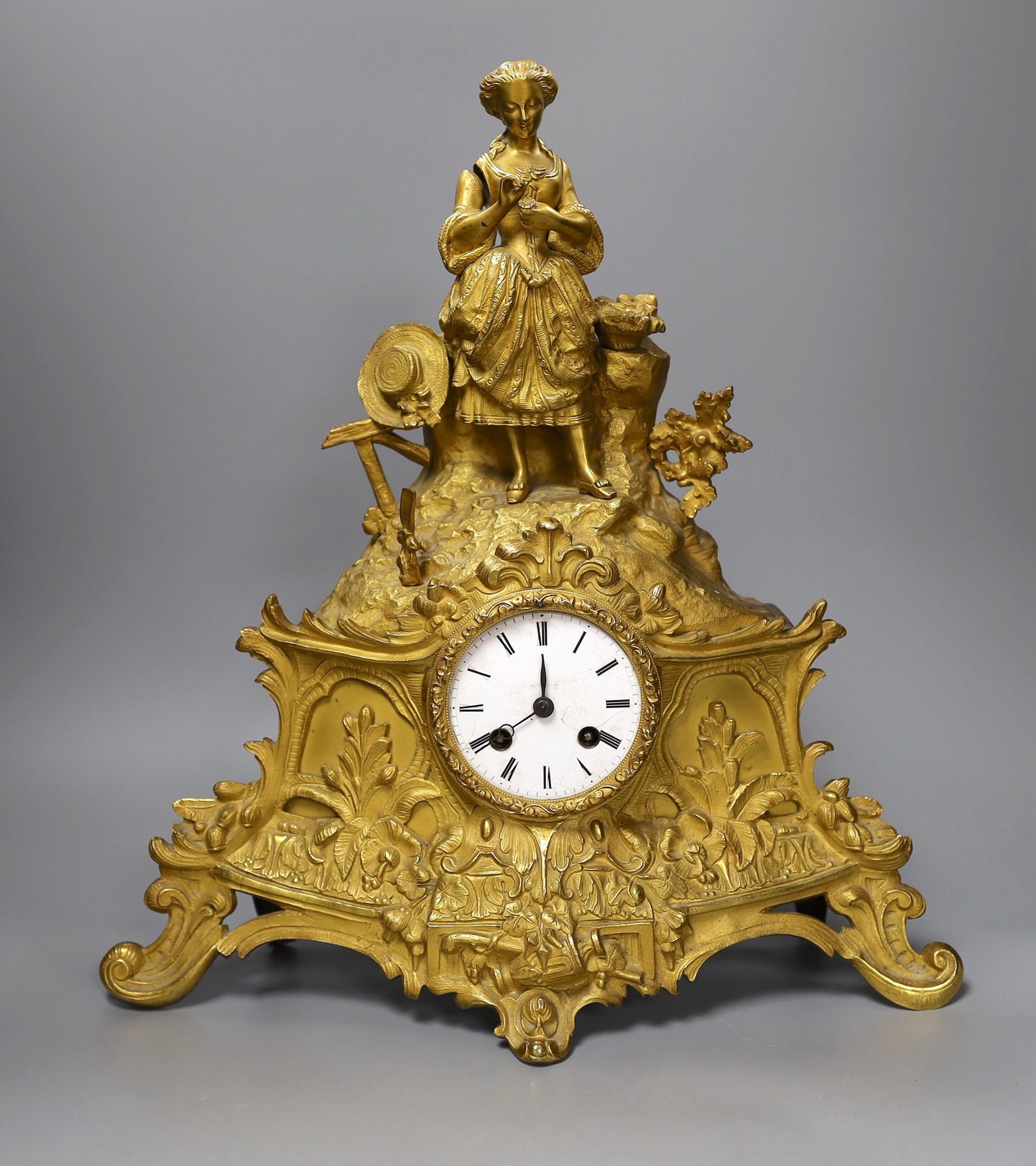 A 19th century French rococo style mantel clock, with pendulum, 42cm